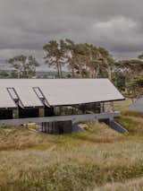 They Turned Soviet-Era Military Bunkers Into a Glass-Walled Multigenerational Home - Photo 7 of 17 -