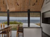 They Turned Soviet-Era Military Bunkers Into a Glass-Walled Multigenerational Home - Photo 11 of 17 -