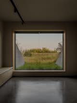 They Turned Soviet-Era Military Bunkers Into a Glass-Walled Multigenerational Home - Photo 10 of 17 -