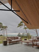 They Turned Soviet-Era Military Bunkers Into a Glass-Walled Multigenerational Home - Photo 14 of 17 -