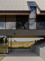 They Turned Soviet-Era Military Bunkers Into a Glass-Walled Multigenerational Home - Photo 16 of 17 -