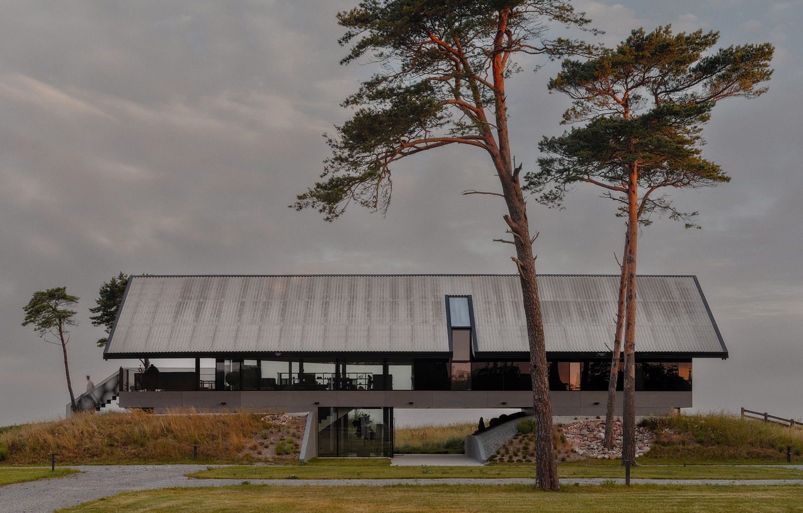 They Turned Soviet-Era Military Bunkers Into a Glass-Walled Multigenerational Home