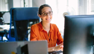 Woman employee works on her computer
