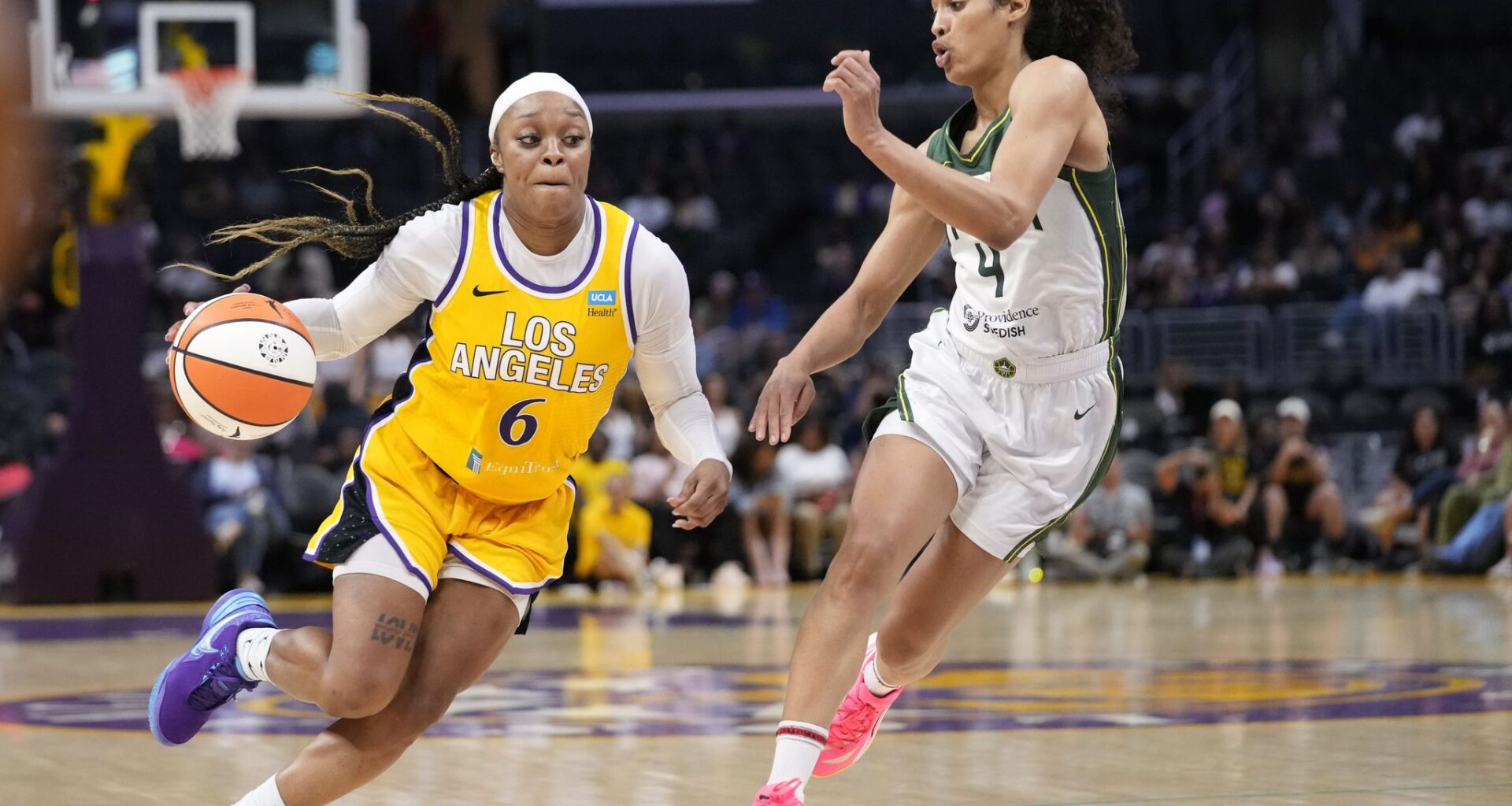 Dallas Stars center Justin Hryckowian (49), right, celebrates his goal with defenseman Lian Bichsel (6) during the second period of an NHL hockey game against the Buffalo Sabres Wednesday, April 15, 2026, in Buffalo, N.Y. (AP Photo/Jeffrey T. Barnes)