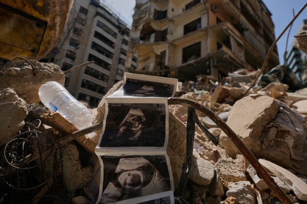 Sonogram images of a baby lie among the rubble of a destroyed building that was hit a week ago in an Israeli airstrike, in central Beirut, Lebanon, Thursday, April 16, 2026. (AP Photo/Hussein Malla, File)