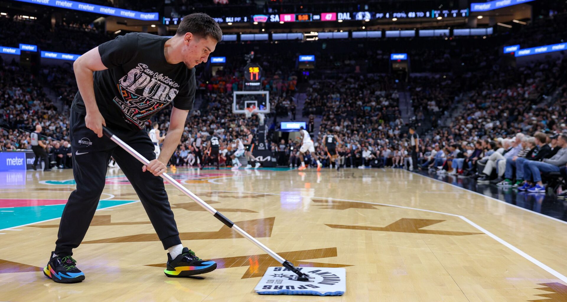 What Spurs' team attendants do during games at Frost Bank Center