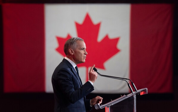 Canada's Prime Minister Mark Carney speaks at the Liberal national convention in Montreal, April 11, 2026. (Christinne Muschi/The Canadian Press via AP, File)