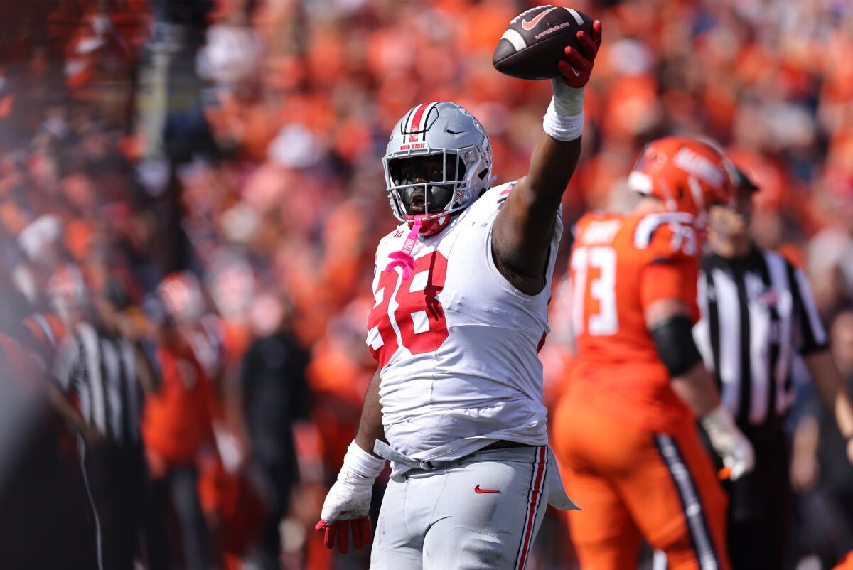 Ohio State defensive lineman Kayden McDonald celebrates after recovering a fumble against Illinois on Oct. 11.