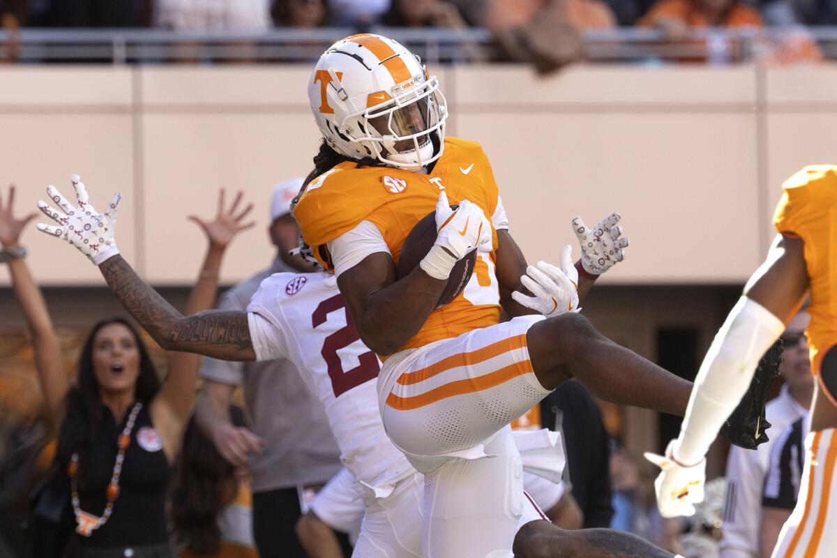 Tennessee defensive back Jermod McCoy intercepts a pass in the end zone against Alabama in October 2024.