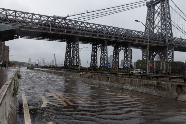 The FDR highway underneath the Williamsburg Bridge in the Lower East Side of Manhattan is closed due to flooding on Sept. 29, 2023, in New York. (AP Photo/Stefan Jeremiah, File)