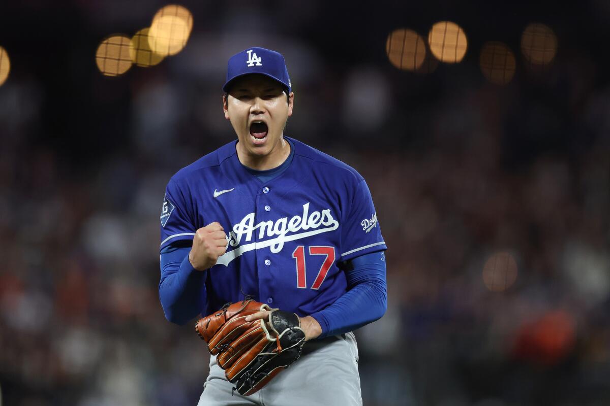 Shohei Ohtani reacts after he struck out Casey Schmitt of the Giants to end the sixth inning.