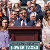 Speaker of the House Mike Johnson, R-La., and fellow Republicans celebrate GOP tax policies at an event outside the Capitol in Washington, Wednesday, April 15, 2026.