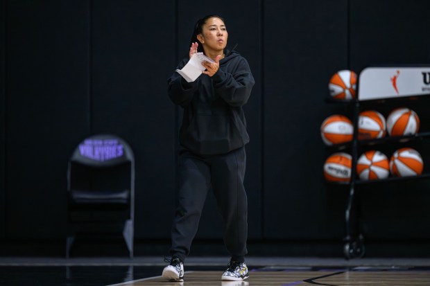 Golden State Valkyries head coach Natalie Nakase claps while watching her players practice during the team's first day of training camp at the Sephora Performance Center in Oakland, Calif., on Sunday, April 19, 2026. (Jose Carlos Fajardo/Bay Area News Group)