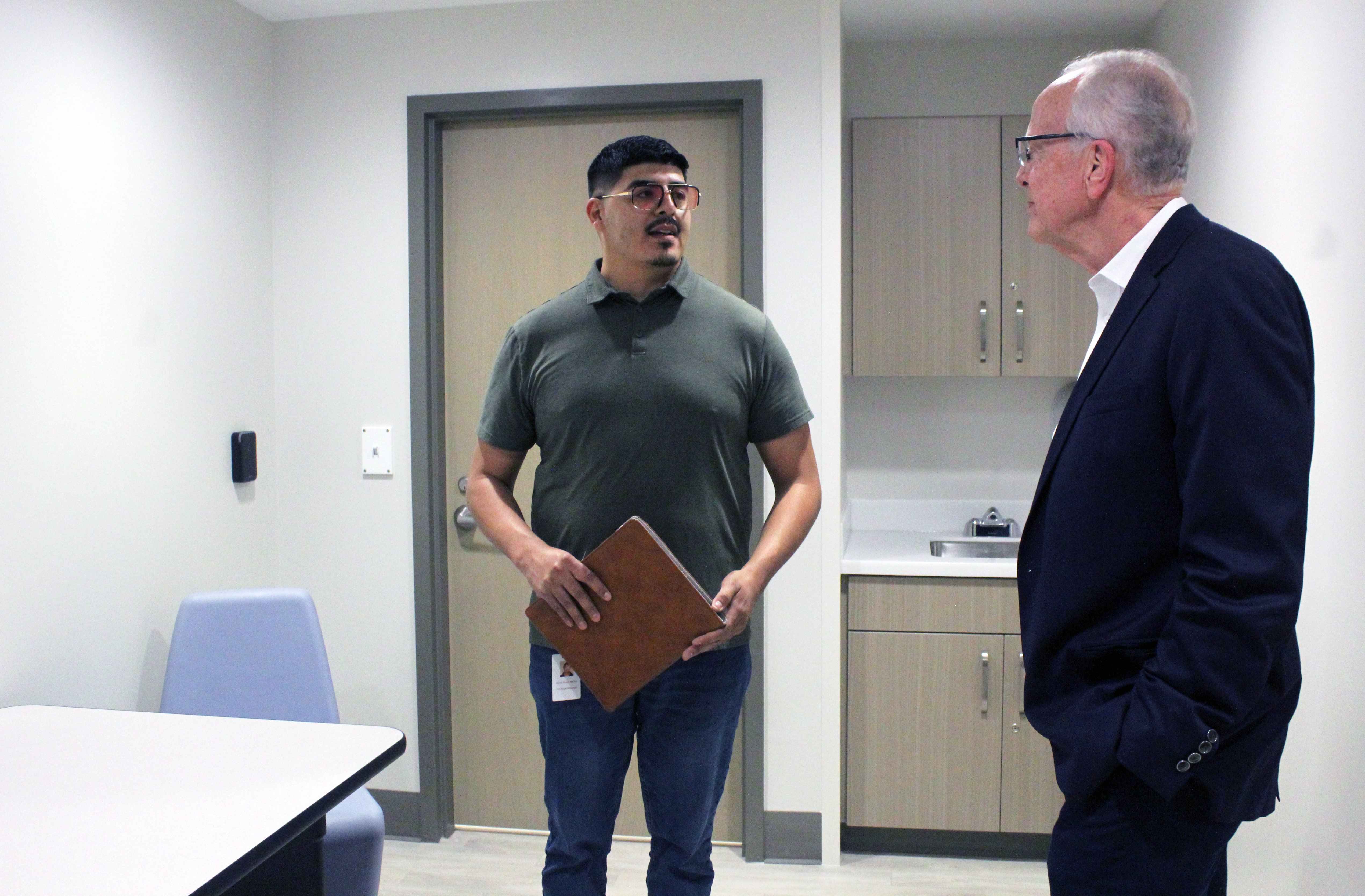 Benito Rivera-Madrid, Crisis Intervention Center operations manager,  in the center's intake room. The center will treat voluntary, involuntary and sobering patients. Photo by Cristina Janney/ Hays Post<br>