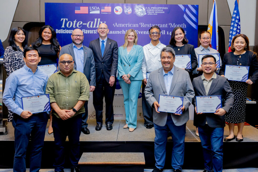 U.S. Department of Agriculture Under Secretary Michelle Bekkering (center), U.S. Embassy Chargé d'Affaires, a.i., Y. Robert Ewing (fourth from left), and U.S. Embassy Agricultural Counselor Michael Ward (third from left) join partner restaurant representatives at the American Restaurant Month launch on April 14 in Manila. 