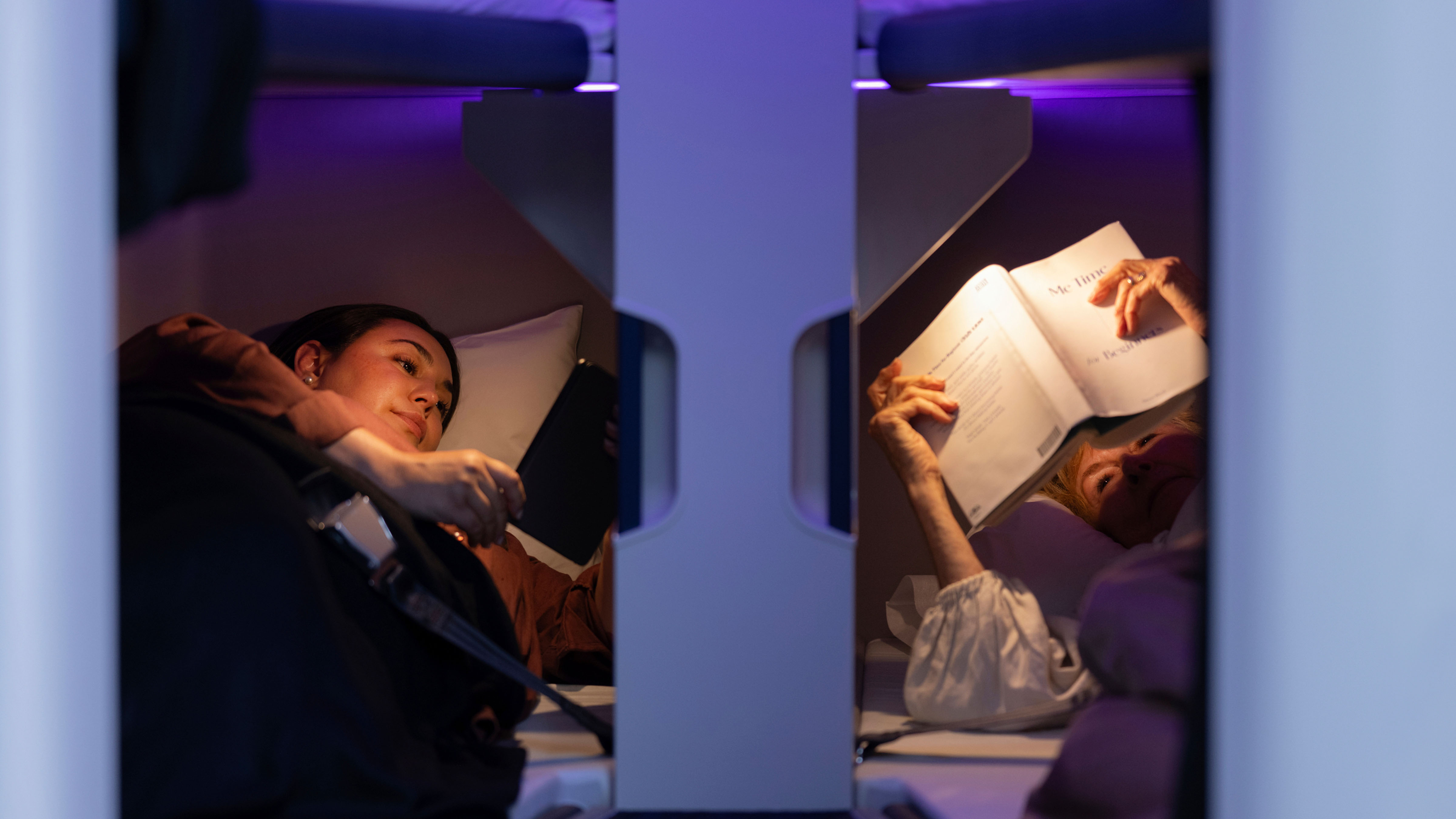 This photo provided by Air New Zealand shows sleeping pods in a mock-up of a plane cabin in Auckland, New Zealand. 