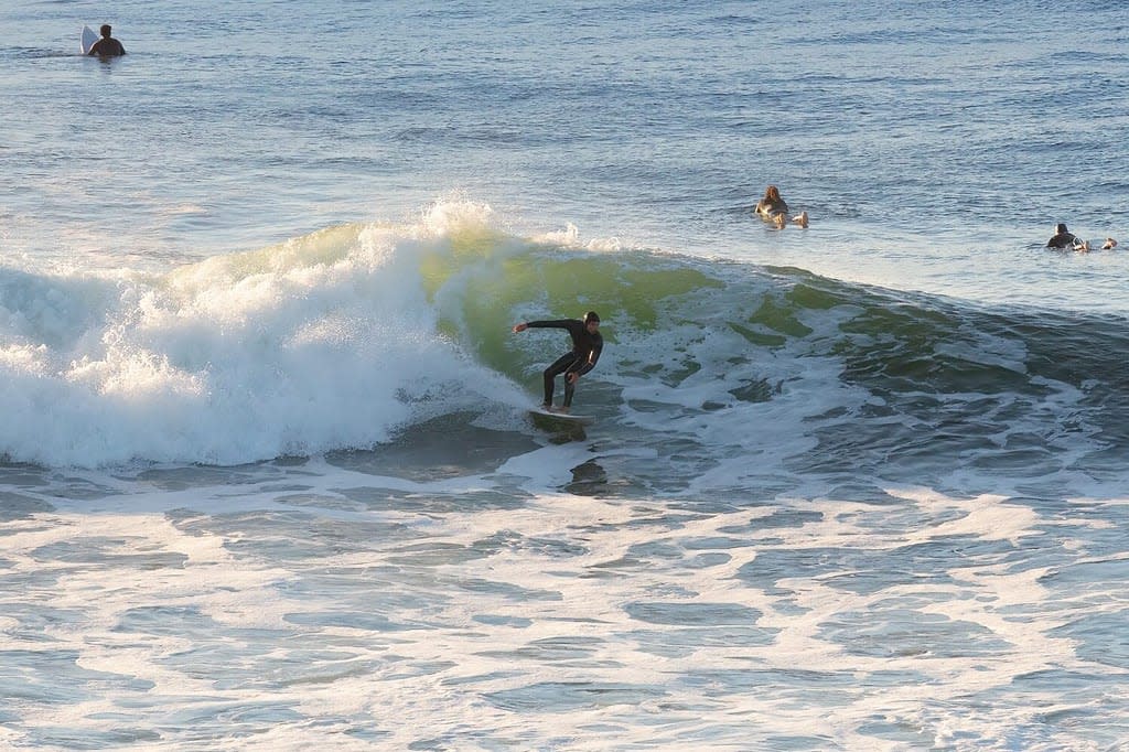Surfer at Punta de Lobos in Pichilemu, Chile
