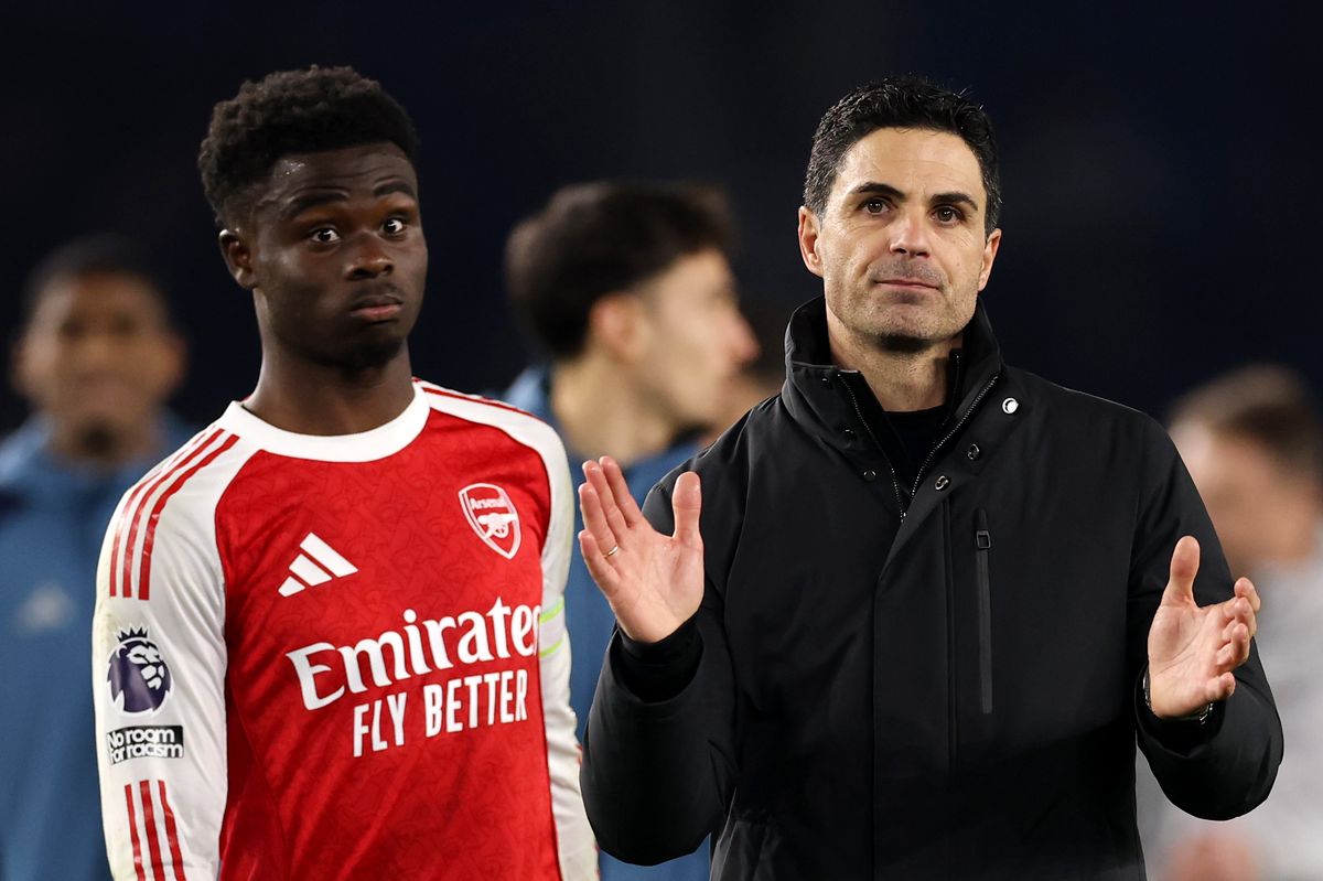 Bukayo Saka and Mikel Arteta