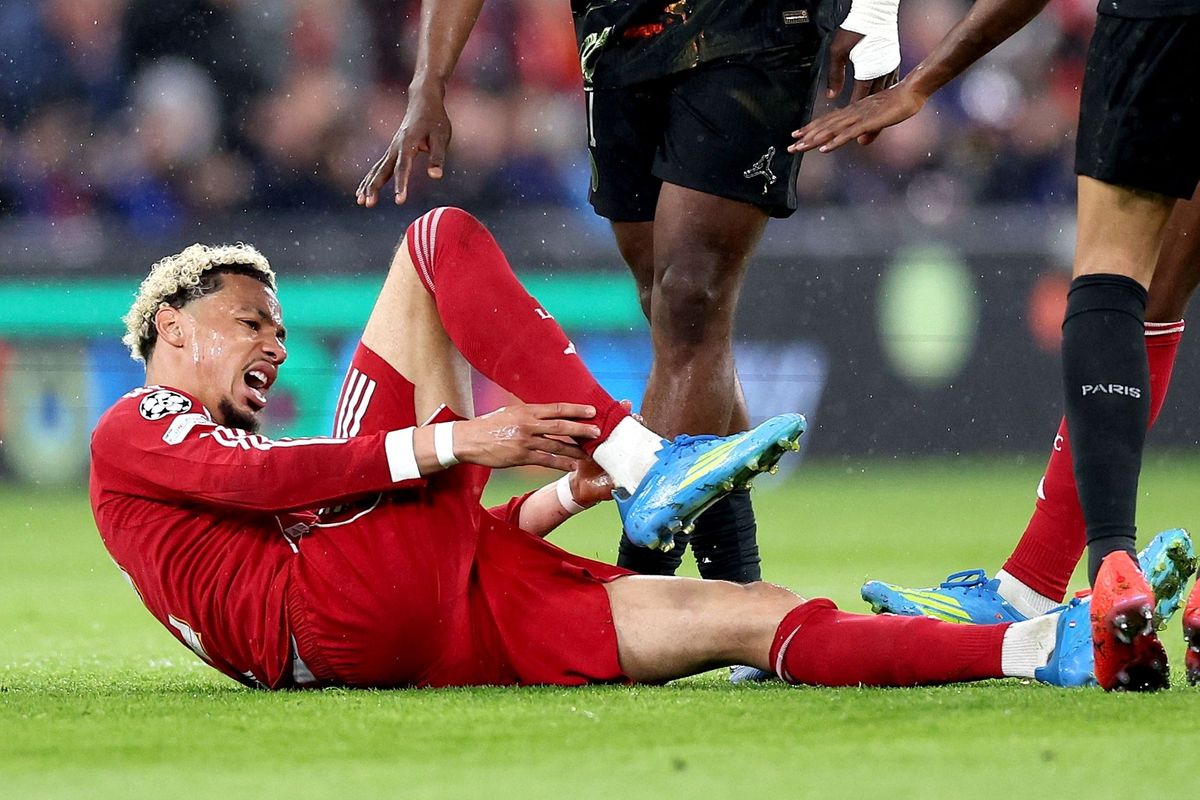 Hugo Ekitike of Liverpool goes down with an injury during the UEFA Champions League quarter-finals, 2nd leg match Liverpool FC against Paris Saint-Germain, in Liverpool, Britain, 14 April 2026.