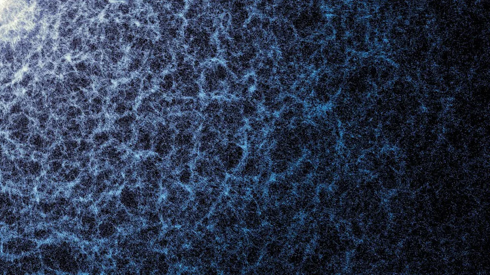  A blue and white map against a dark background. The denser areas indicate regions where galaxies and galaxy clusters have clumped together to form the strands of the cosmic web. . 