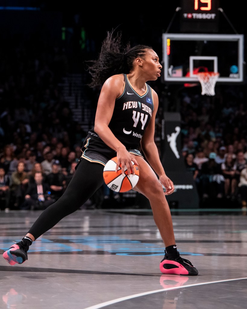 Betnijah Laney-Hamilton #44 of the New York Liberty handles the ball during the 2024 WNBA playoffs.