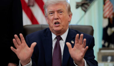 U.S. President Trump signs an executive order in the Oval Office of the White House