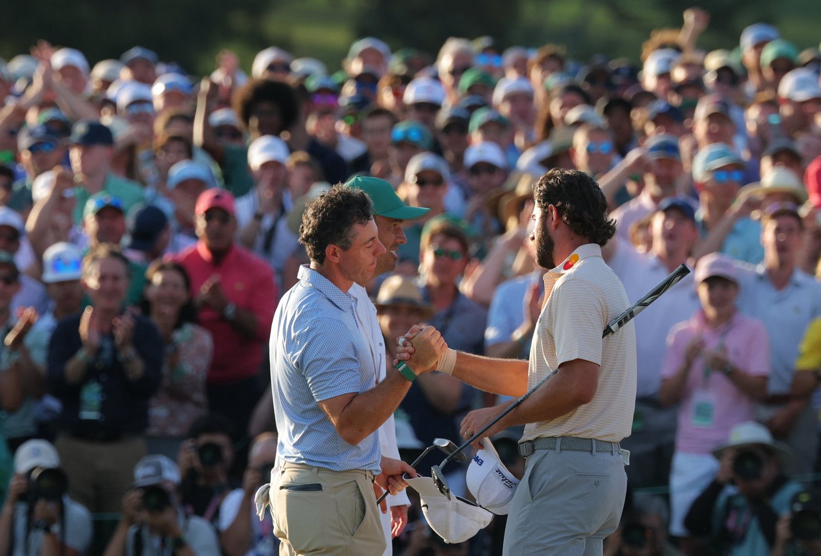 Rory McIlroy and Cameron Young