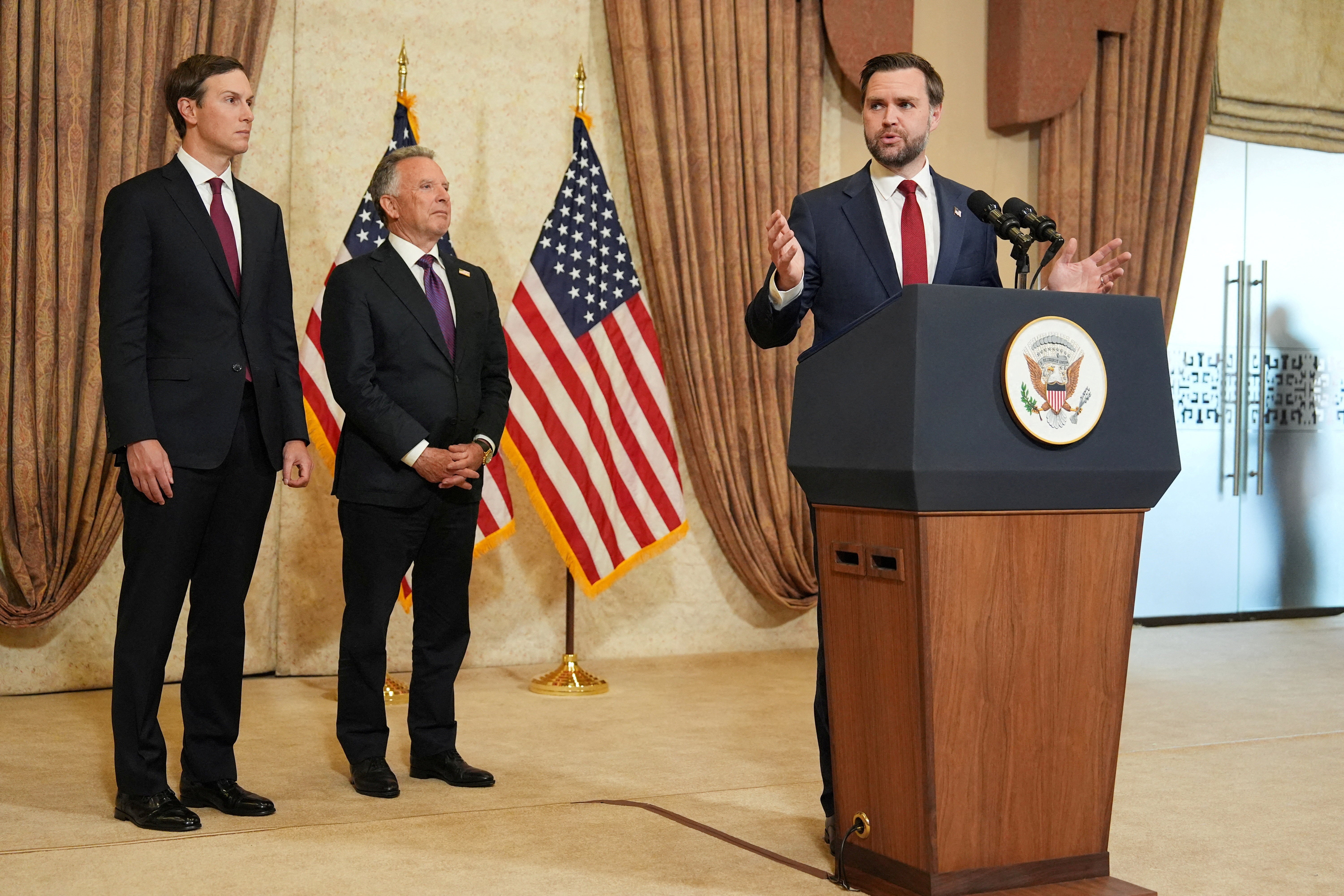 JD Vance, with envoys Steve Witkoff and Jared Kushner, speaks during a press conference on 12 April