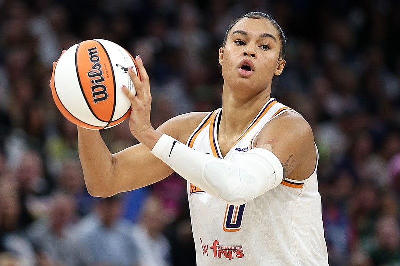 FILE - Phoenix Mercury forward Satou Sabally (0) looks to pass against the Minnesota Lynx during the first half of Game 2 of a WNBA basketball playoff semifinals series Tuesday, Sept. 23, 2025, in Minneapolis. (AP Photo/Matt Krohn, File)