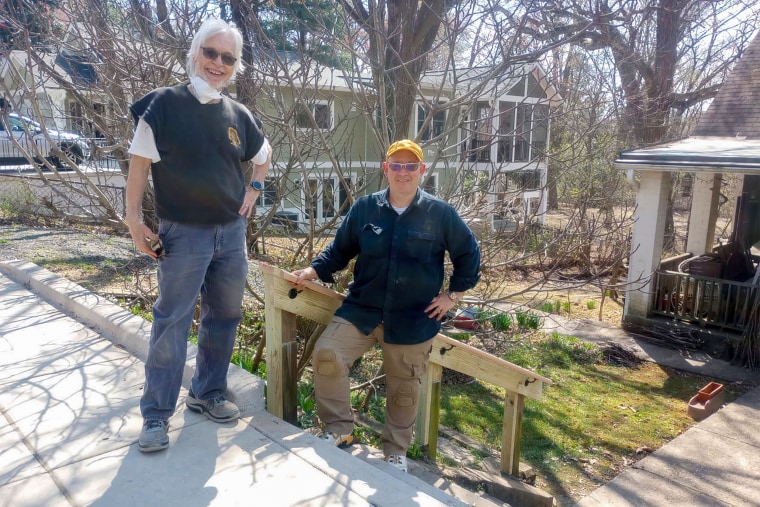 Image: John Burg volunteering at Village of Takoma Park, providing free repairs to the community.