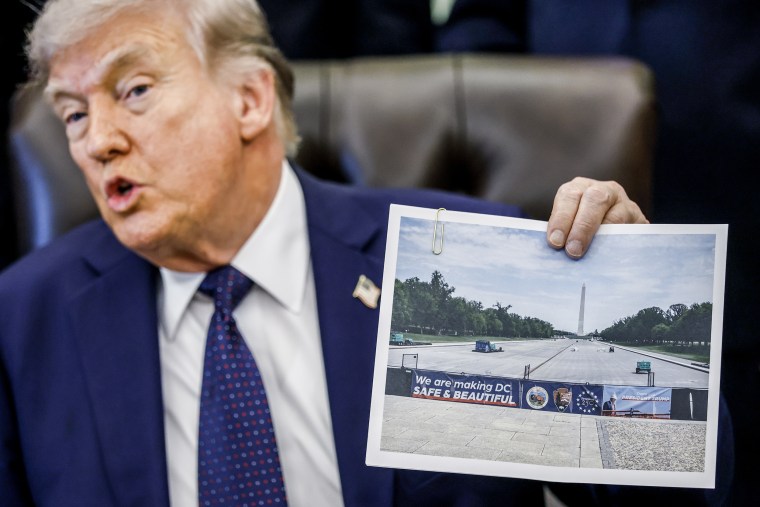 Donald Trump speaks while seated in the Oval Office. 