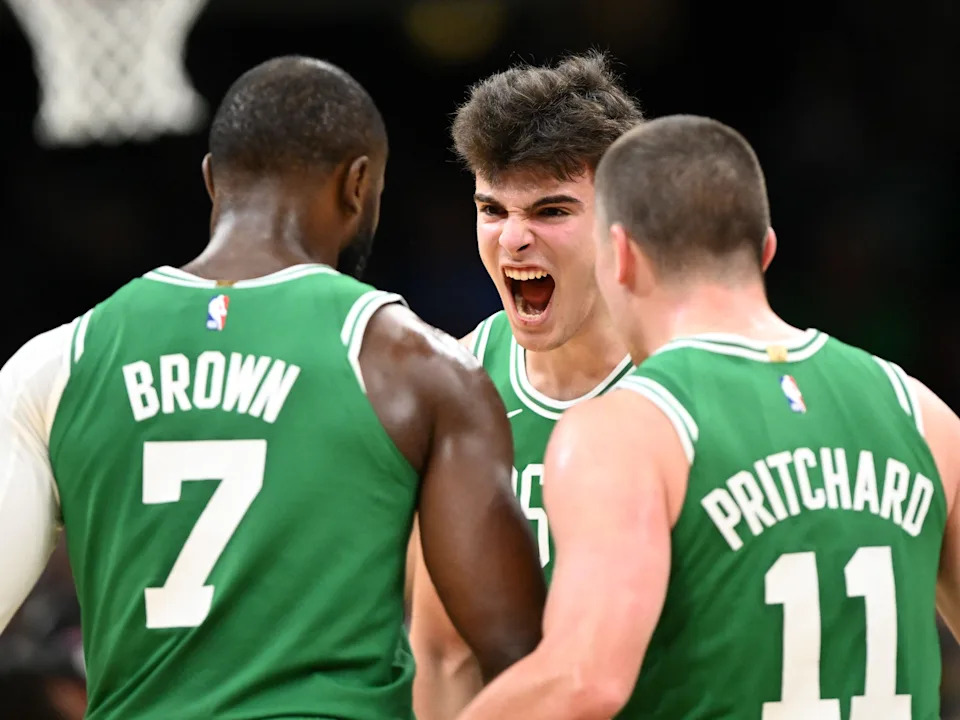 Dec 2, 2025; Boston, Massachusetts, USA; Boston Celtics guard Hugo Gonzalez (28) reacts with guard Jaylen Brown (7) and guard Payton Pritchard (11) during the first half of a game against the New York Knicks at the TD Garden. Mandatory Credit: Brian Fluharty-Imagn Images