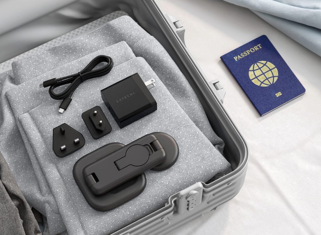 A suitcase with a passport and objects