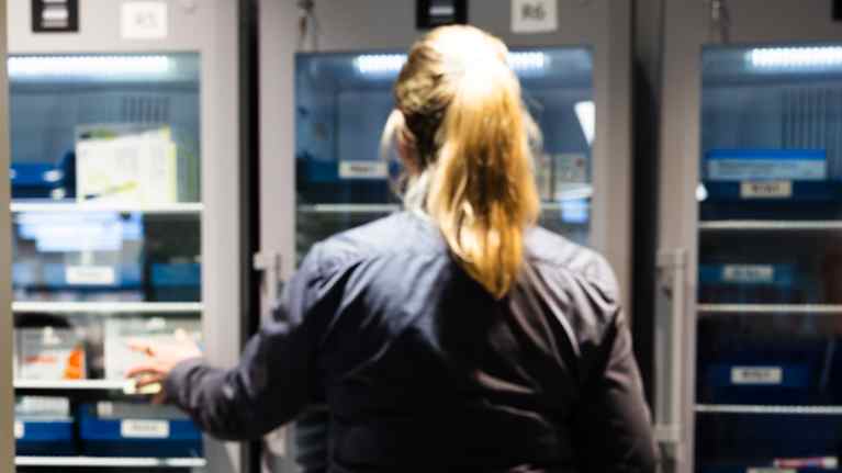 Women collecting prescription medication.