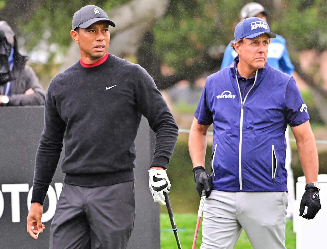 THOUSAND OAKS, CA - OCTOBER 25: Tiger Woods watches his tee shot on the 10th hole while Phil Mickelson gets ready to hit during the final round of the ZOZO Championship at Sherwood Country Club on October 25, 2020 in Thousand Oaks, California. (Photo by John McCoy/PGA TOUR via Getty Images)