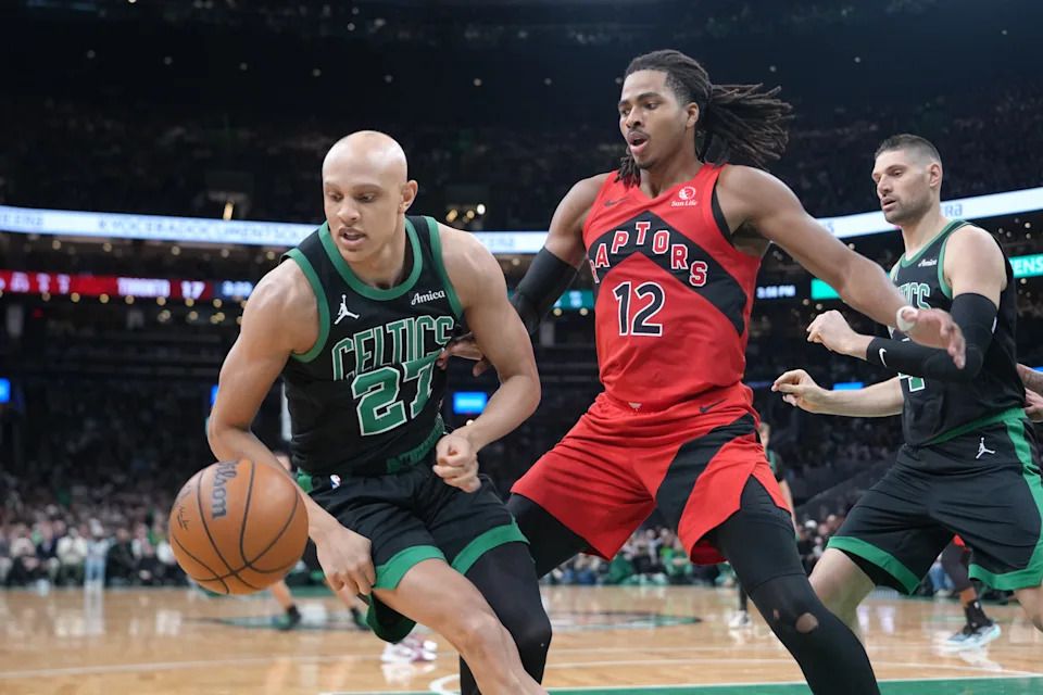 Apr 5, 2026; Boston, Massachusetts, USA; Boston Celtics guard Jordan Walsh (27) chases a loose ball against Toronto Raptors forward Collin Murray-Boyles (12) during the first half at TD Garden. Mandatory Credit: Gregory Fisher-Imagn Images