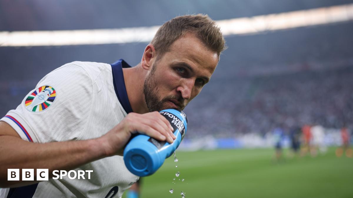England captain Harry Kane drinks from a water bottle