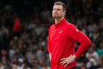 Portland Trail Blazers acting head coach Tiago Splitter watches play during the first half of an NBA basketball game against the San Antonio Spurs, Wednesday, April 8, 2026, in San Antonio.