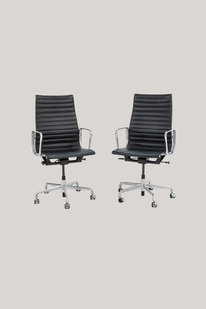 1stDibs 2014 Herman Miller Eames Aluminum Group Executive Desk Chair w/ Pneumatic Base against pale beige background.