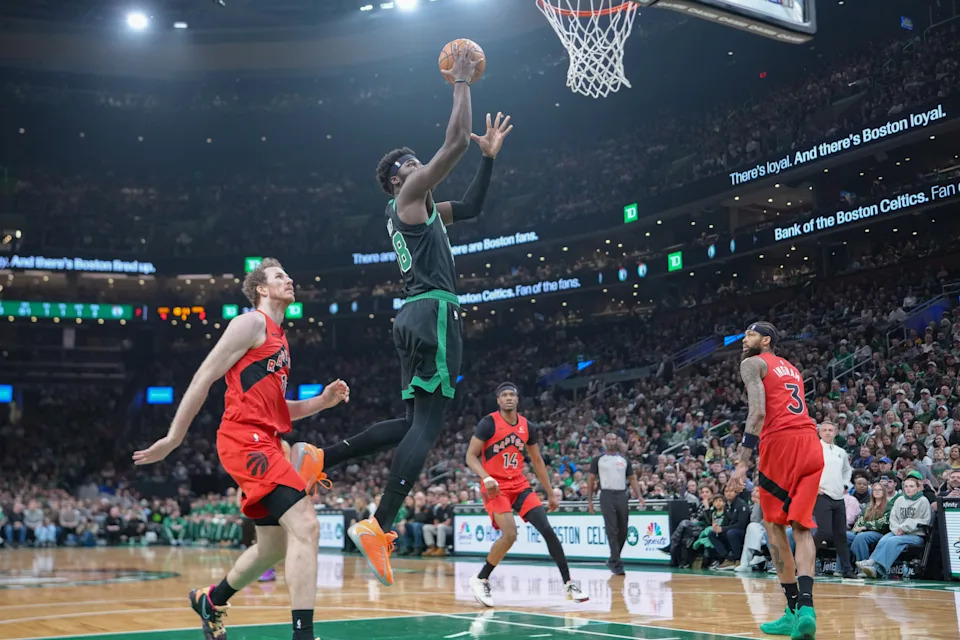 Apr 5, 2026; Boston, Massachusetts, USA; Boston Celtics center Neemias Queta (88) shoots a layup against the Toronto Raptors during the first half at TD Garden. Mandatory Credit: Gregory Fisher-Imagn Images