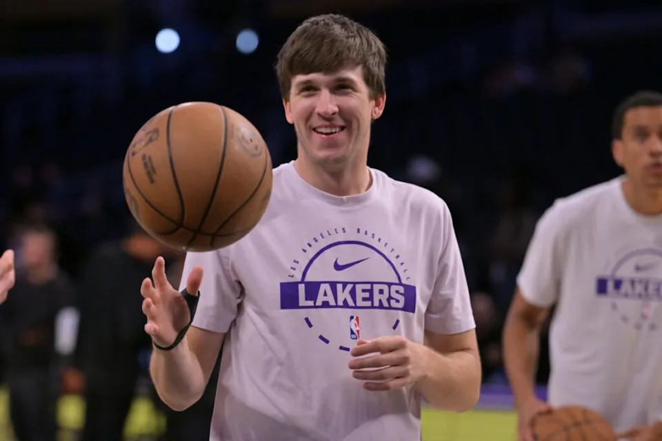 Los Angeles Lakers guard Austin Reaves (15) warms up prior to the game against the Cleveland Cavaliers at Crypto.com Arena. Mandatory Credit: Jayne Kamin-Oncea-Imagn Images