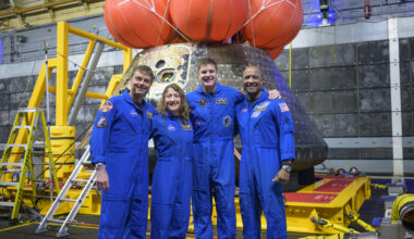 NASA astronauts Reid Wiseman, commander; left, Christina Koch, mission specialist; CSA (Canadian Space Agency) astronaut Jeremy Hansen, mission specialist; and NASA astronaut Victor Glover, Artemis II pilot, right, pose for a group photo after viewing the Orion spacecraft in the well deck of USS John P. Murtha, Saturday, April 11, 2026, in the Pacific Ocean off the coast of California. The quartet splashed down Friday, April 10 at 5:07 p.m. PDT (8:07p.m. EDT).