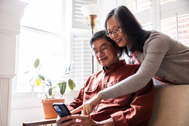 Looking through photos and reminiscing can help engage your brain and memory.