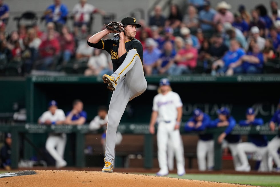 Pittsburgh Pirates pitcher Braxton Ashcraft winds up to deliver to the Texas Rangers in a...