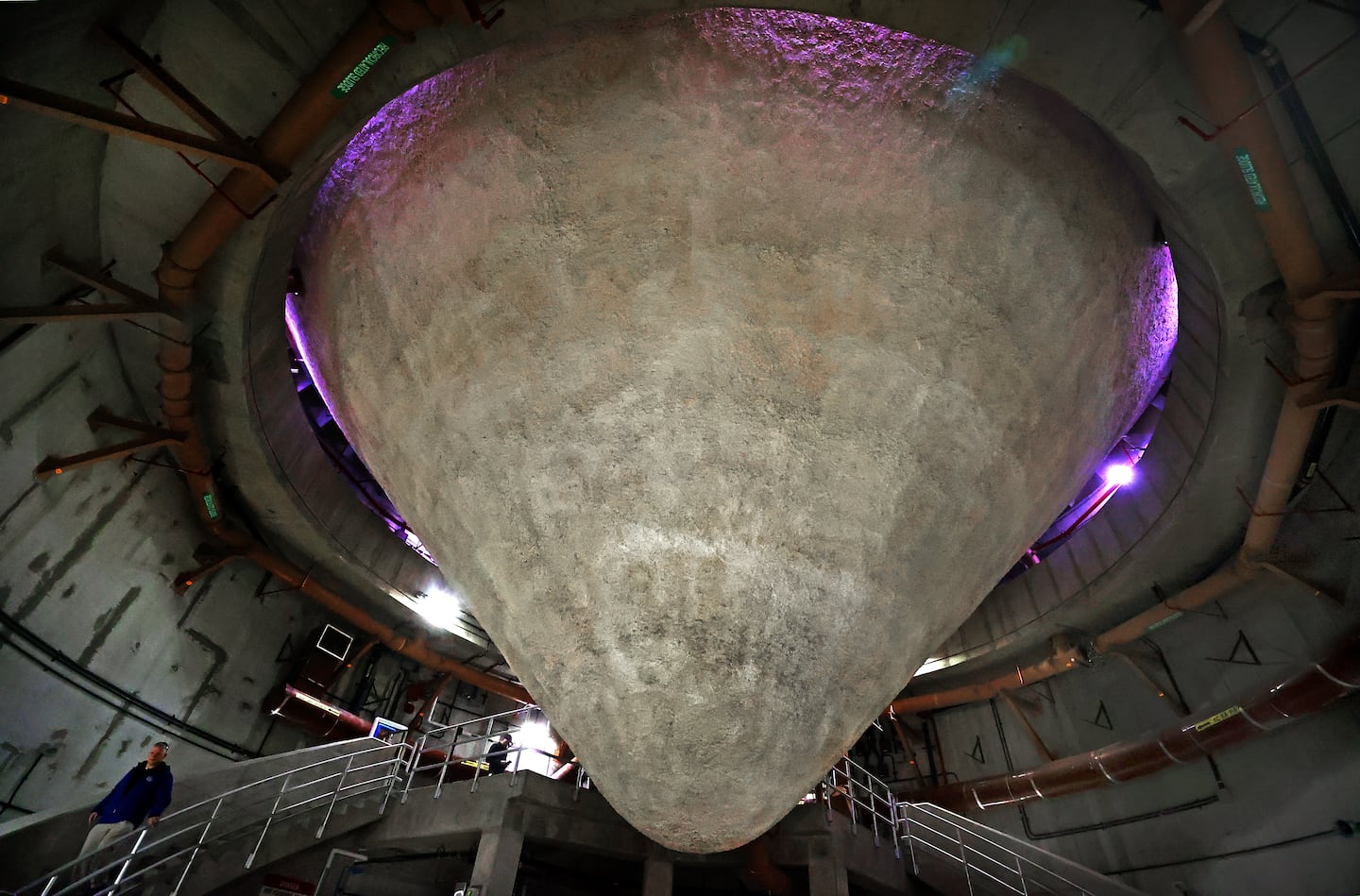 The gigantic digesters at Deer Island from the outside and the inside.