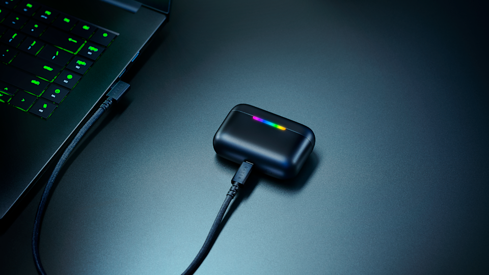 Some earbuds connected to a PC.