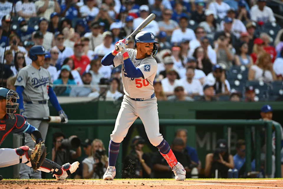 Apr 4, 2026; Washington, District of Columbia, USA; Los Angeles Dodgers shortstop Mookie Betts (50) at bat against the Washington Nationals during the first inning at Nationals Park. Mandatory Credit: Brad Mills-Imagn Images