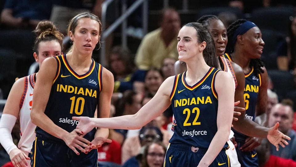 Indiana Fever guard Caitlin Clark (22) and guard Lexie Hull (10) celebrate after a play in the second half against the <a class="link " href="https://sports.yahoo.com/wnba/teams/connecticut/" data-i13n="sec:content-canvas;subsec:anchor_text;elm:context_link" data-ylk="slk:Connecticut;sec:content-canvas;subsec:anchor_text;elm:context_link;itc:0" data-yga="{"yLinkElement":"context_link","yModuleName":"content-canvas","yLinkText":"Connecticut","ySubModuleName":"anchor_text","yHasCommerce":false}">Connecticut</a> Sun.Trevor Ruszkowski-Imagn Images