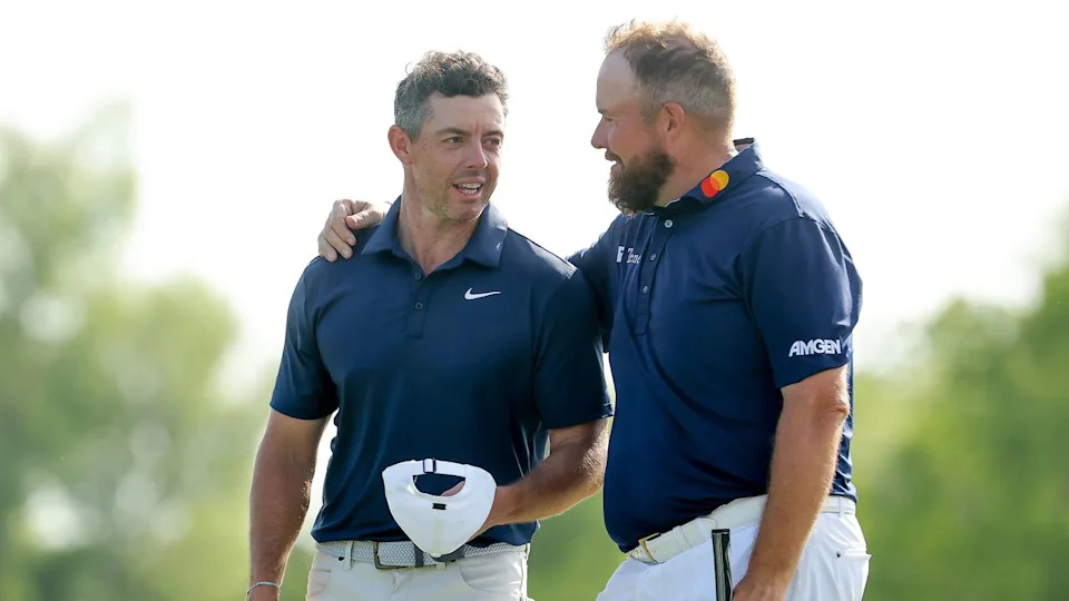  Shane Lowry with his arm around Rory McIlroy at the 2025 Zurich Classic. 