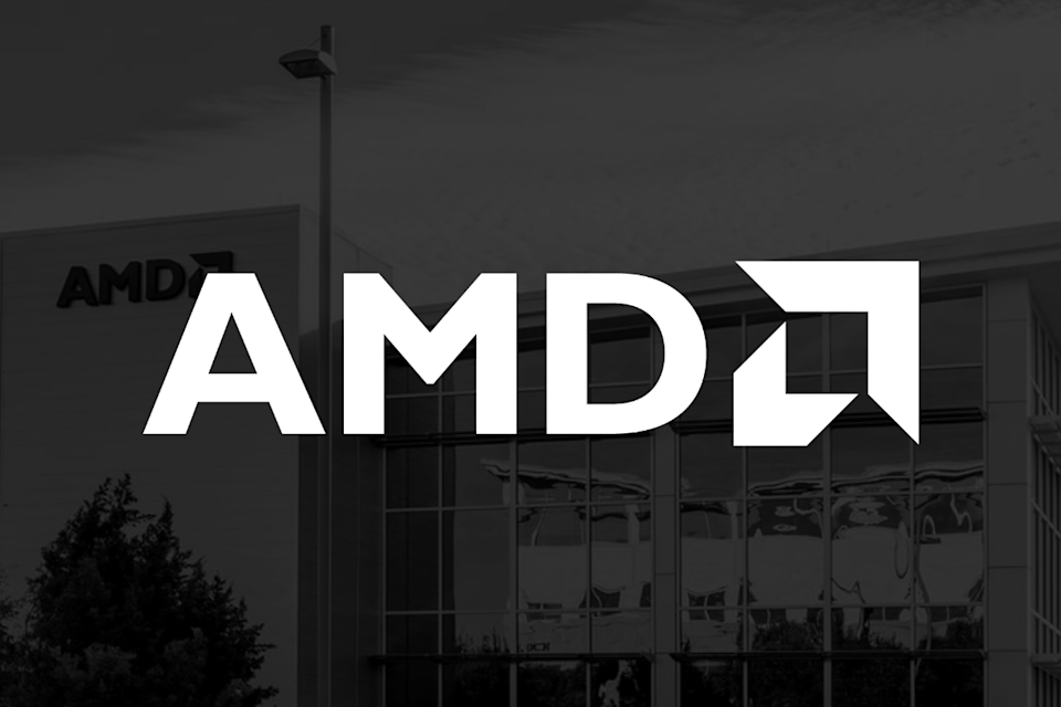 The AMD logo superimposed over an image of the company's headquarters building.